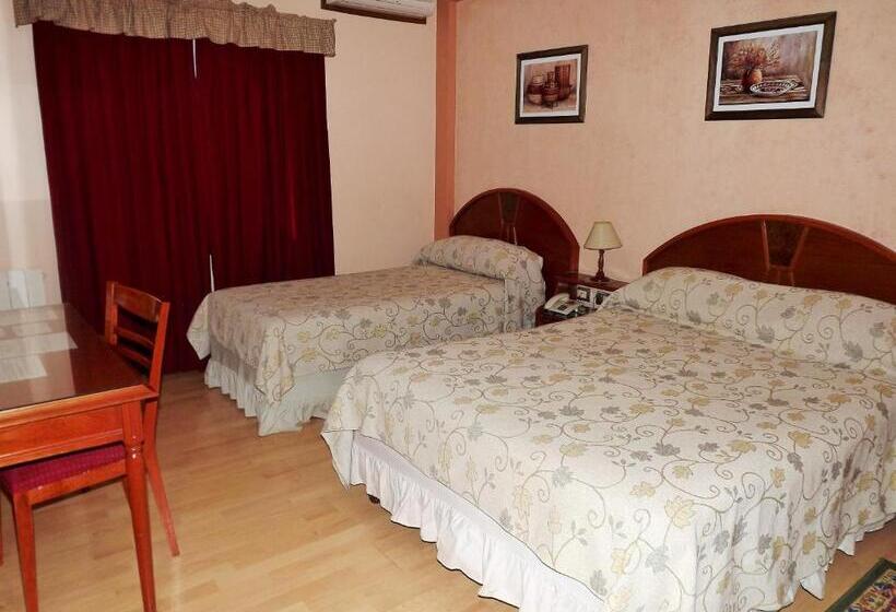 غرفة عائلية تنفيذية, Escala Uno