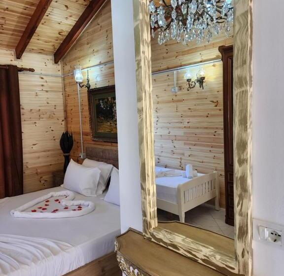 جناح ديلوكس, Bujtina Syni Zi Keshtjella   Shengjin