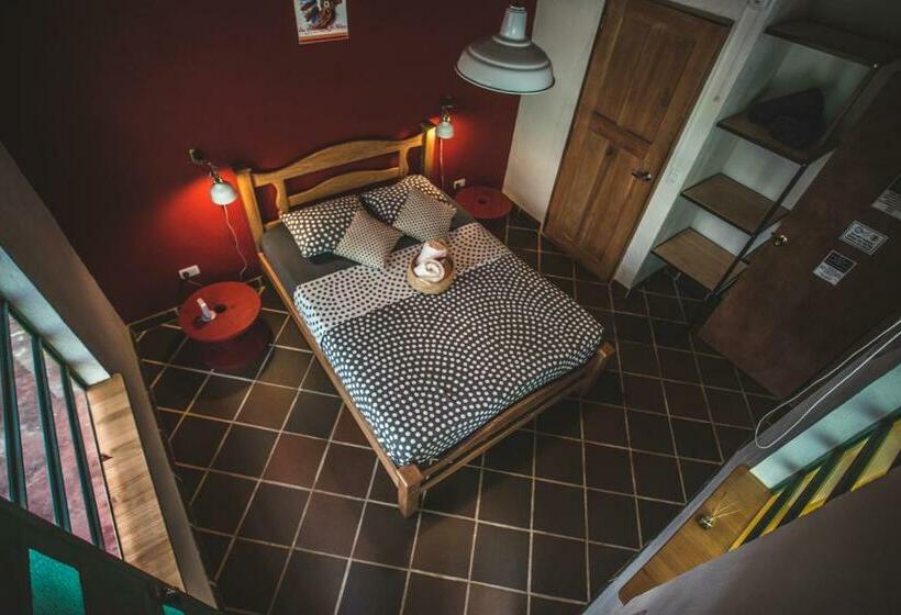 חדר דלוקס עם מרפסת, Finca Hostal Bolivar   Casa Maracuya