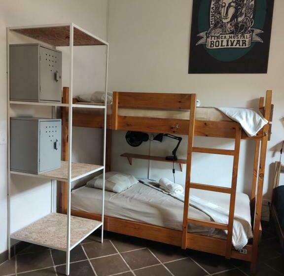 سرير فى غرفة مشتركه, Finca Hostal Bolivar   Casa Maracuya