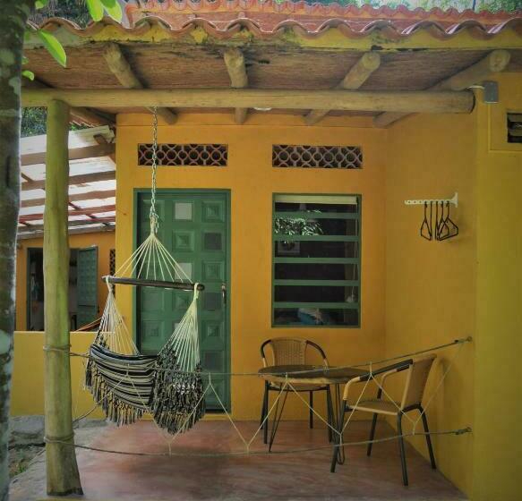 חדר דלוקס עם מרפסת, Finca Hostal Bolivar   Casa Maracuya