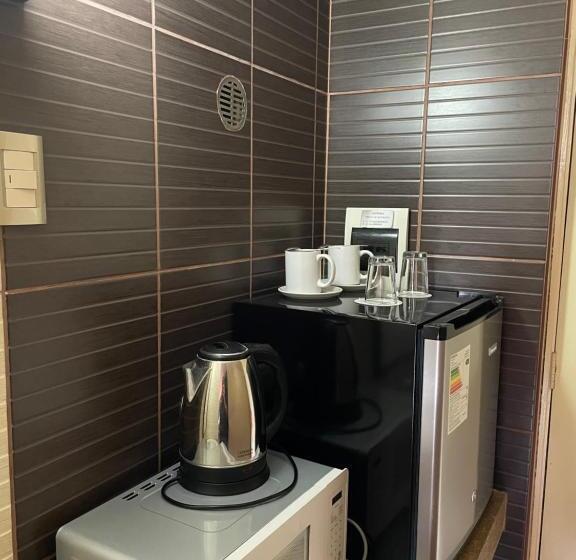 חדר סטנדרט עם מיטת קינג, Holiday Suites