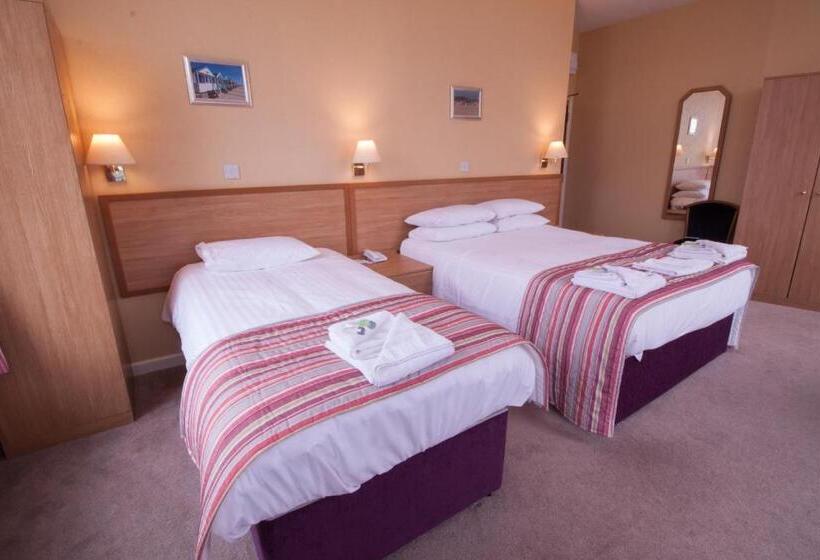 غرفة عائلية, New Beach