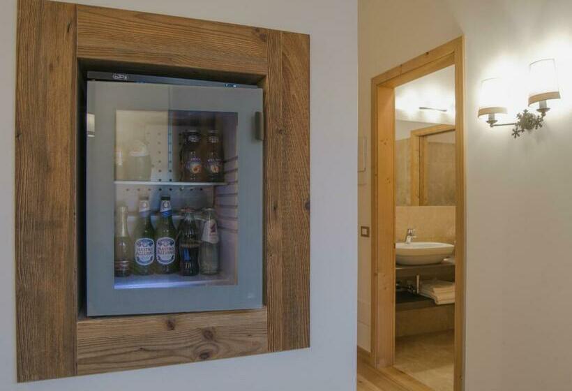 جناح جونيور, Garni Caminetto