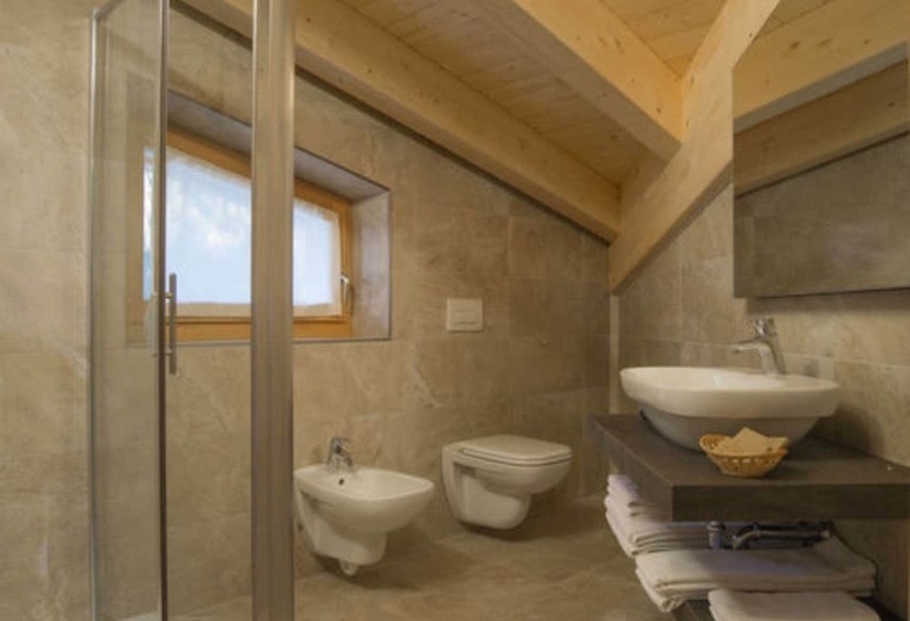 جناح جونيور, Garni Caminetto