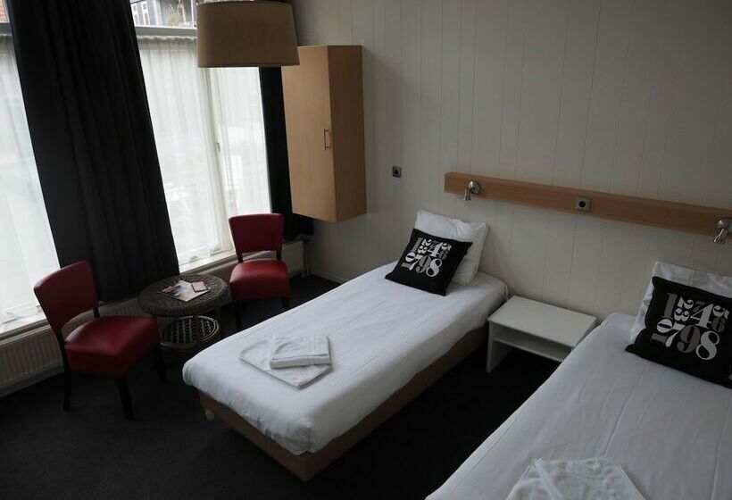 اتاق اکونومی با حمام مشترک, T Anker