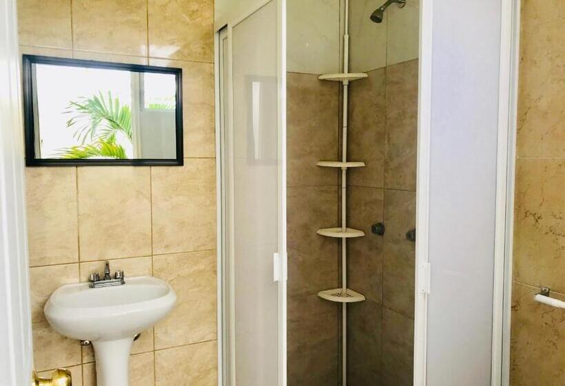 سرير فى غرفة مشتركه, & Suites Cerro Roj0