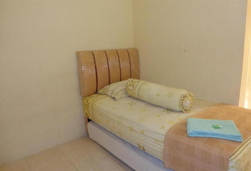 单人经济间, Musafir Inn