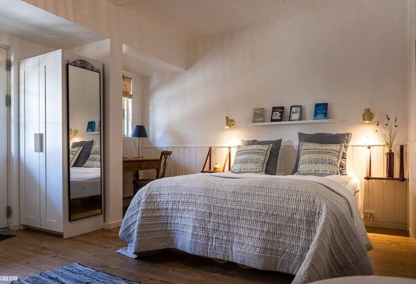 غرفة عائلية مطلّة علي الحديقة, Liseleje Bade