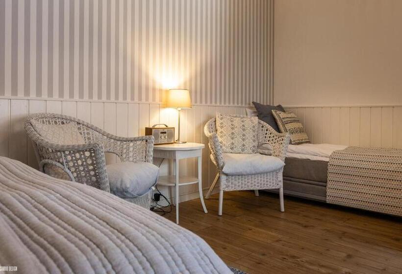 غرفة عائلية, Liseleje Bade