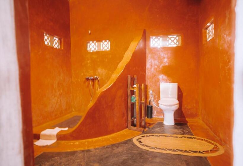 اتاق استاندارد چهارنفره با چشم‌انداز باغ, Pili Pili Beach Bungalows