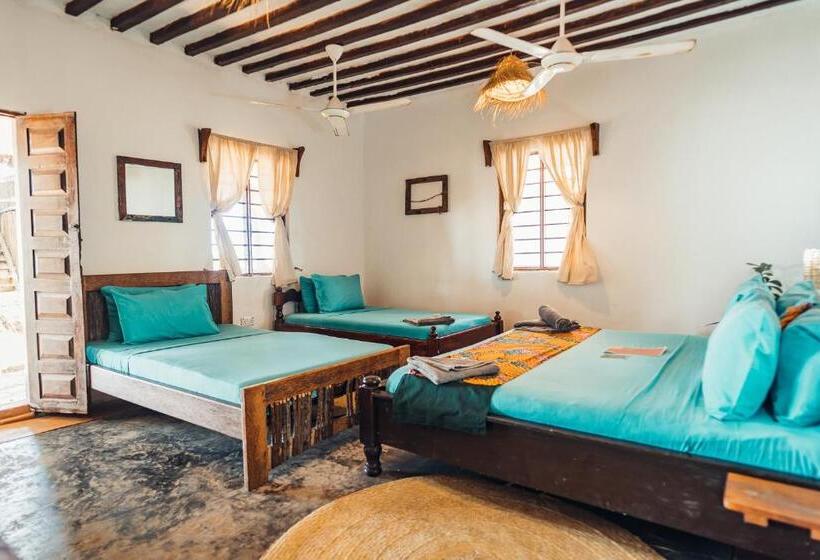 اتاق استاندارد چهارنفره با چشم‌انداز باغ, Pili Pili Beach Bungalows
