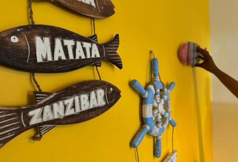 اتاق استاندارد چهارنفره با چشم‌انداز باغ, Pili Pili Beach Bungalows