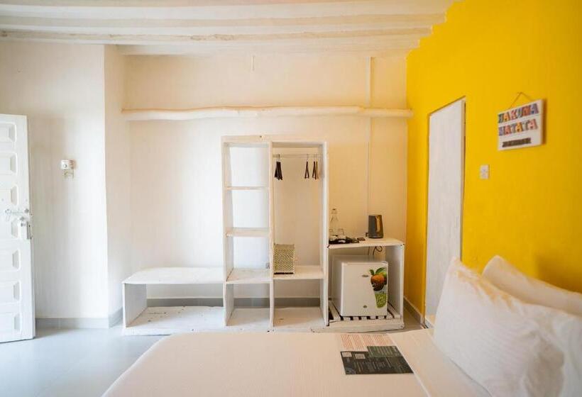 اتاق استاندارد چهارنفره با چشم‌انداز باغ, Pili Pili Beach Bungalows
