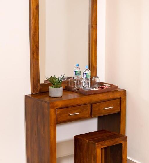 غرفة قياسية فردية, Tharusha