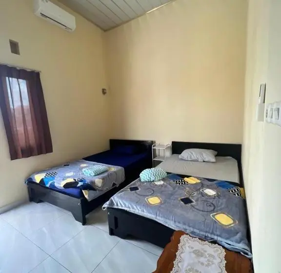 Łóżko we Wspólnym Pokoju, Kbi Hostel