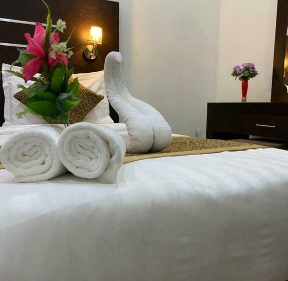 キングサイズベッドのスーペリアルーム, Rest Night Serviced Apartments Al Nafal