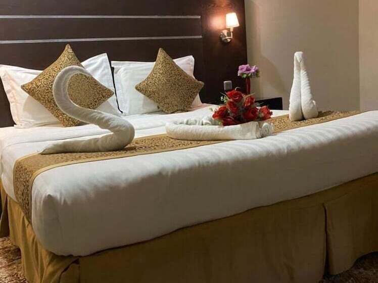 キングサイズベッドのスーペリアルーム, Rest Night Serviced Apartments Al Nafal