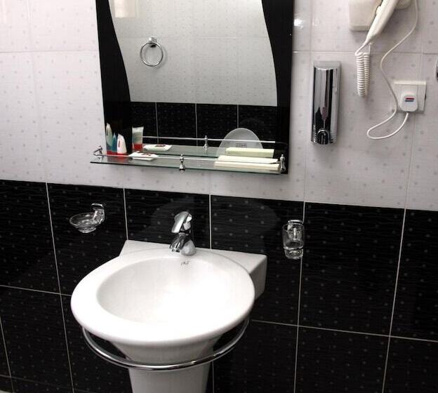 キングサイズベッドのスーペリアルーム, Rest Night Serviced Apartments Al Nafal