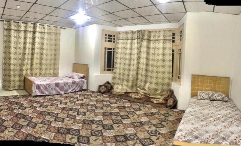 اتاق خانوادگی با چشم‌انداز باغ, Serenity Guest House