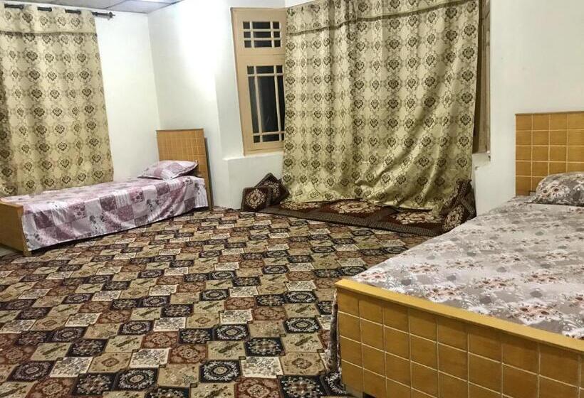 اتاق خانوادگی با چشم‌انداز باغ, Serenity Guest House