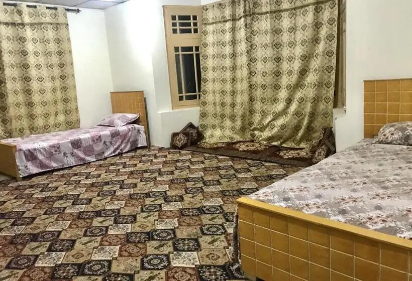 اتاق خانوادگی با چشم‌انداز باغ, Serenity Guest House