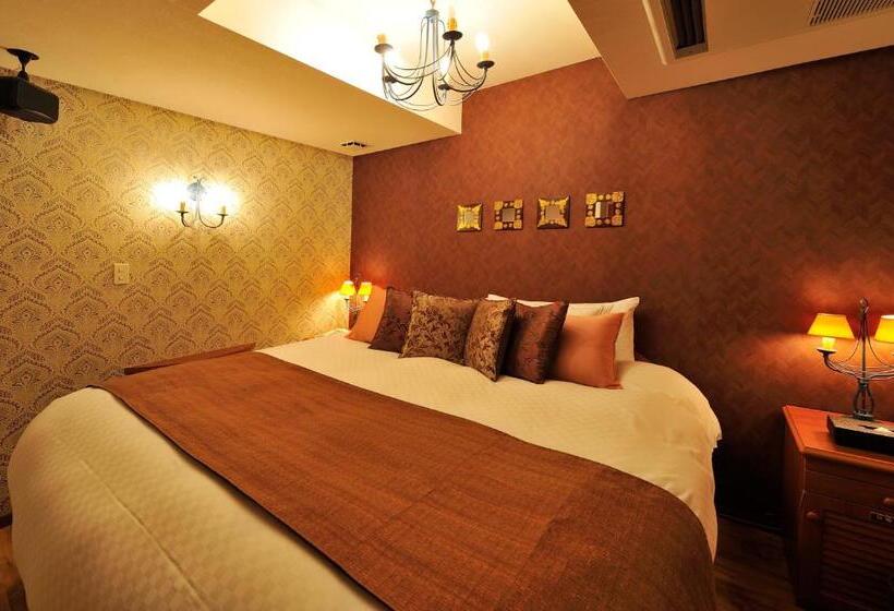 디럭스 룸 킹사이즈 침대, Fukuoka Chapel Coconuts Hotel Ipolani