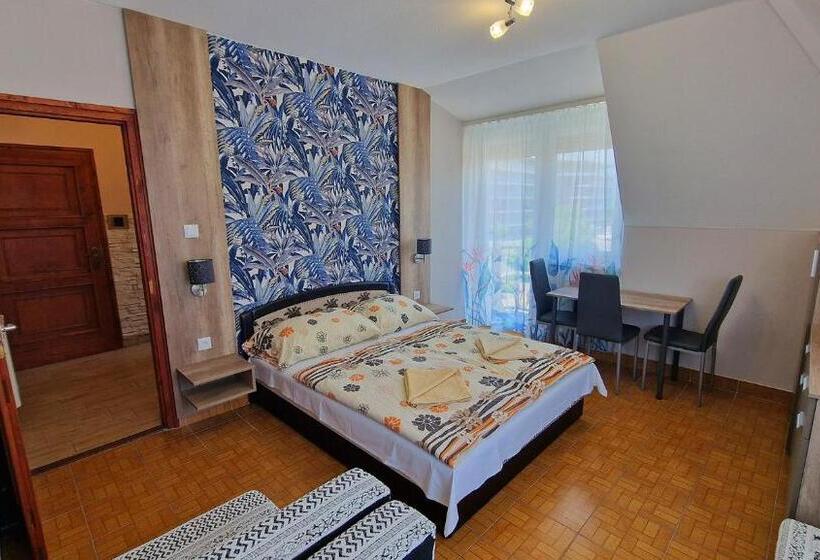 Апартаменты 1 Спальня, Napsugár Apartmanház