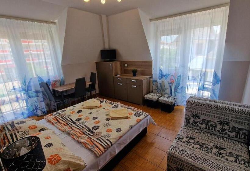 Апартаменты 1 Спальня, Napsugár Apartmanház