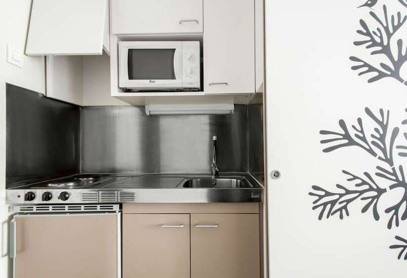 이그제큐티브 스튜디오, Residencia Universitaria Roberto De Nobili