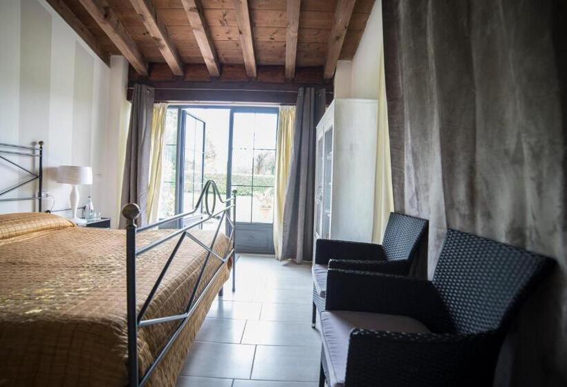 חדר סטנדרט לשלושה עם נוף לגינה, Villa Franca In Franciacorta