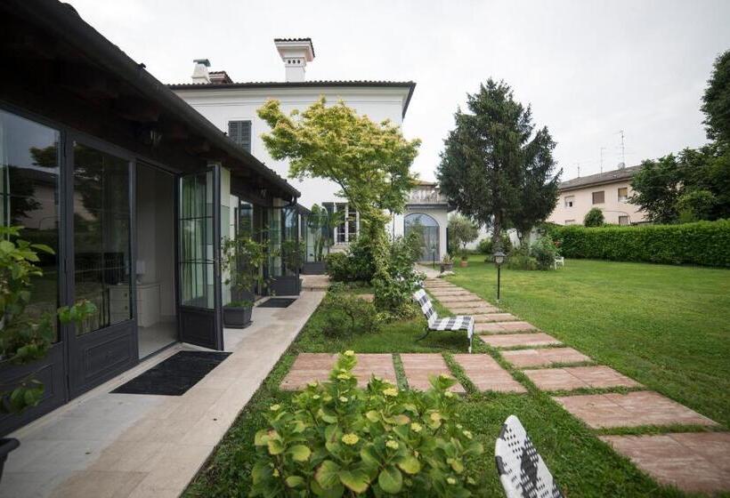 חדר סטנדרט לשלושה עם נוף לגינה, Villa Franca In Franciacorta