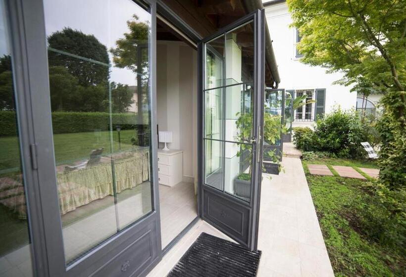 חדר סטנדרט לשלושה עם נוף לגינה, Villa Franca In Franciacorta