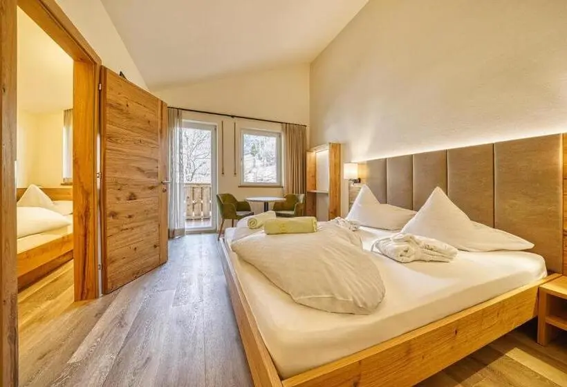 سوییت خانوادگی, Family Hotel Gutenberg