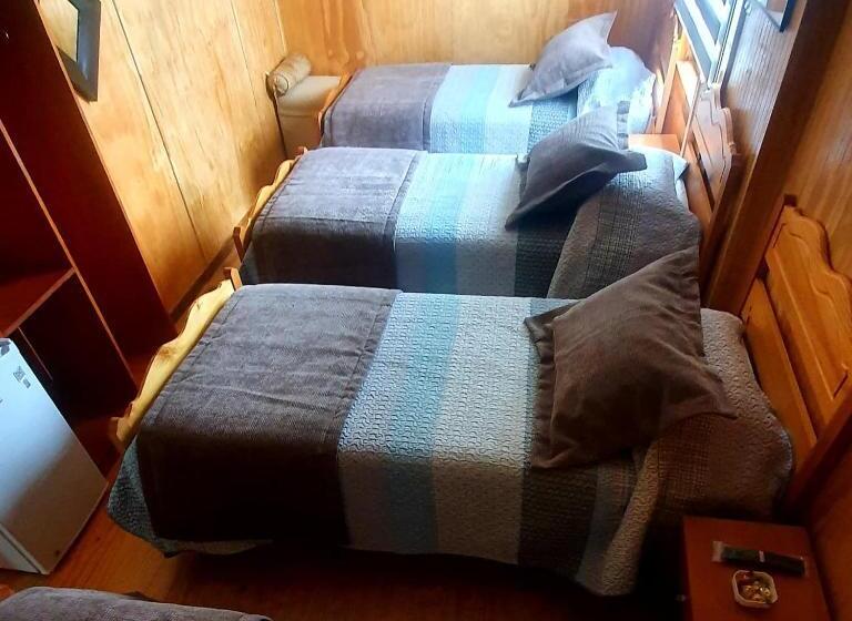 غرفة قياسية رباعية, Hostal Galvarino Puerto Natales