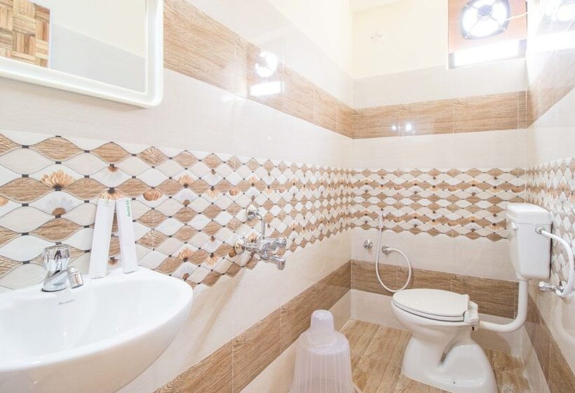 Habitación Deluxe, Treebo Midtown