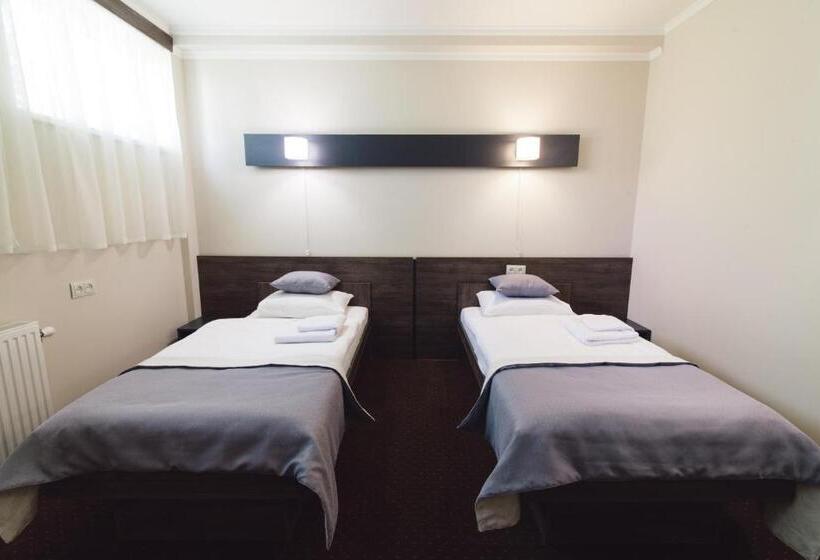 اتاق استاندارد, Zinedine Sport