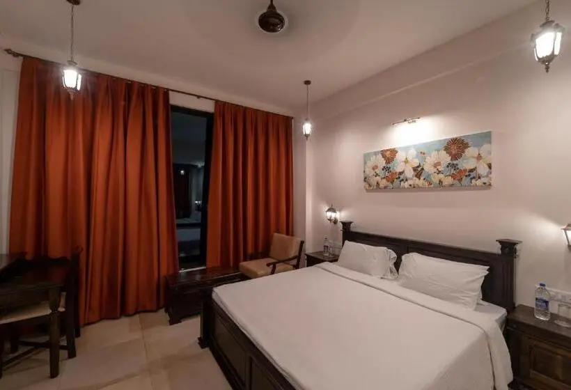 キングサイズベッドのデラックスルーム, Triose Boutique Hotel Lonavala