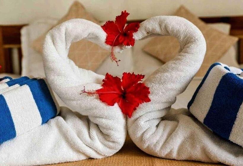 اتاق خانوادگی با چشم‌انداز باغ, Romantic Beach Villas