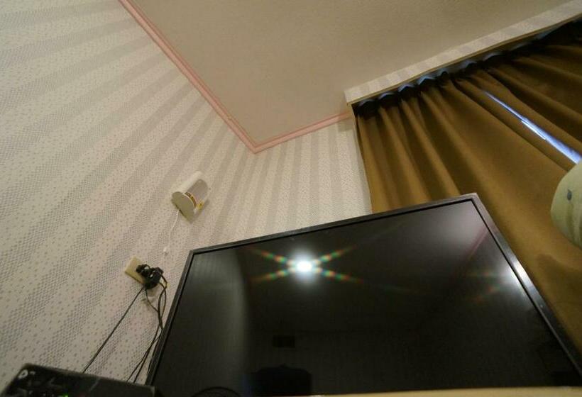 اتاق لوکس, Yi Yuan