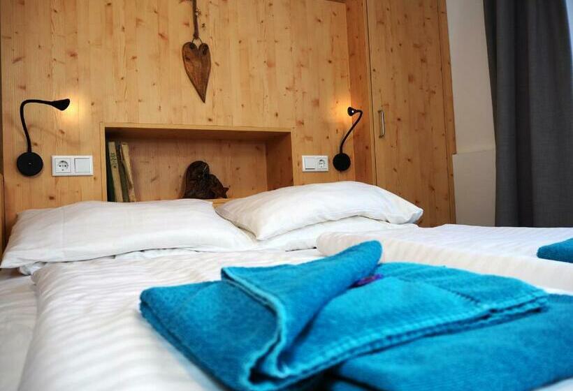 غرفة قياسية رباعية, Dav Haus