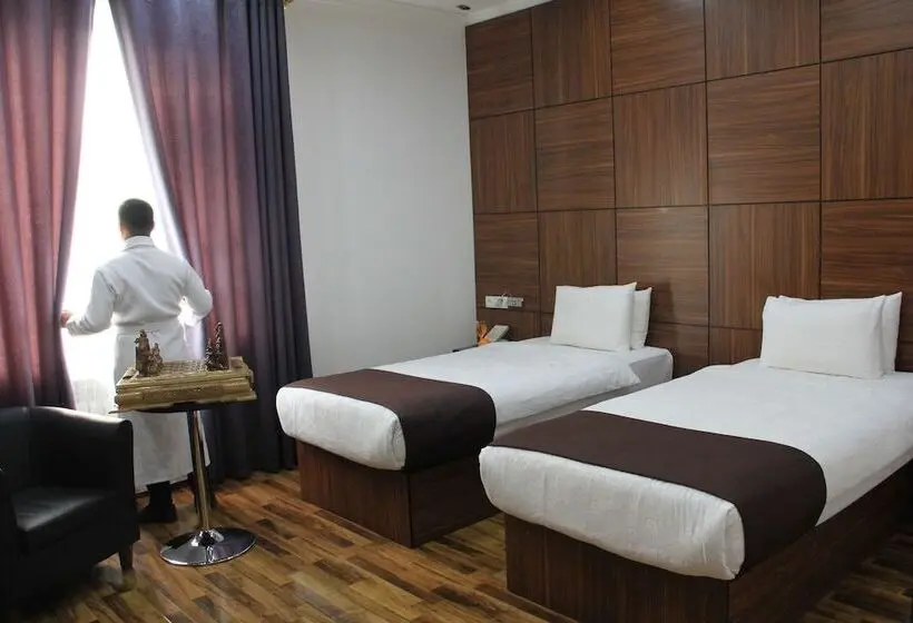 Quarto deluxe, Asmald Palace