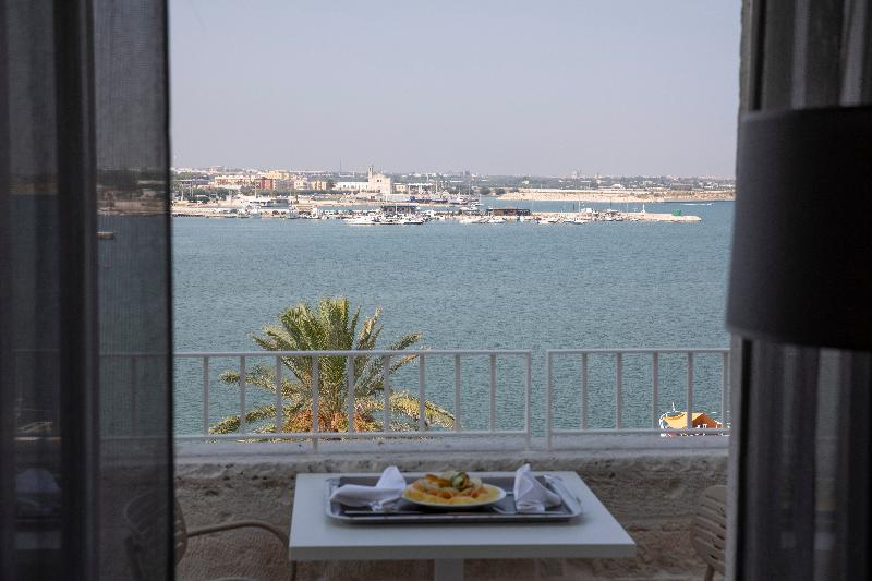 מיטת קינג בסוויטה, Holiday Inn Resort Qionghai Guantang, An Ihg