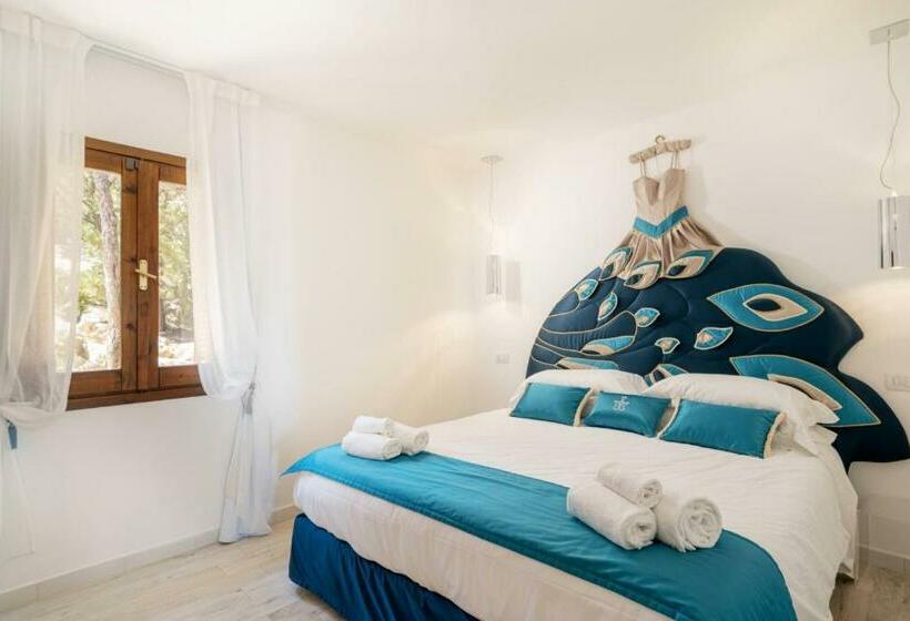 מיטת קינג בסוויטה, Geco Di Giada Art Suites   Adult Only