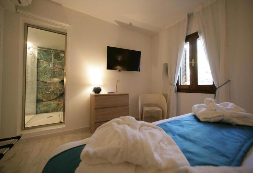 מיטת קינג בסוויטה, Geco Di Giada Art Suites   Adult Only