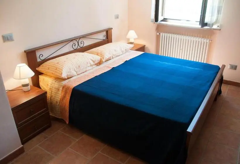 Huoneisto 1 Makuuhuone Puutarhanäkymä, Cascina La Romana
