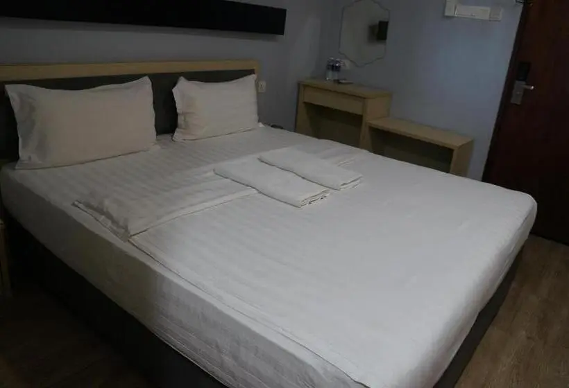キングサイズベッドのデラックスルーム, Unikarya Lodge
