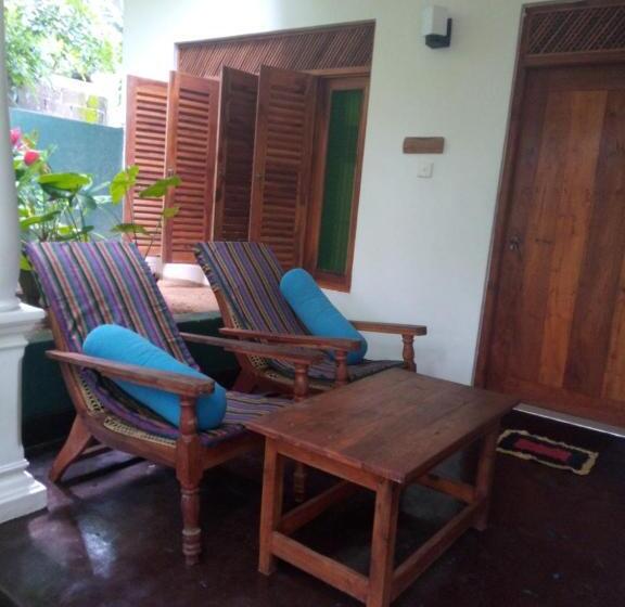 اتاق استاندارد چهارنفره با چشم‌انداز باغ, Sansala Guesthouse & Restaurant