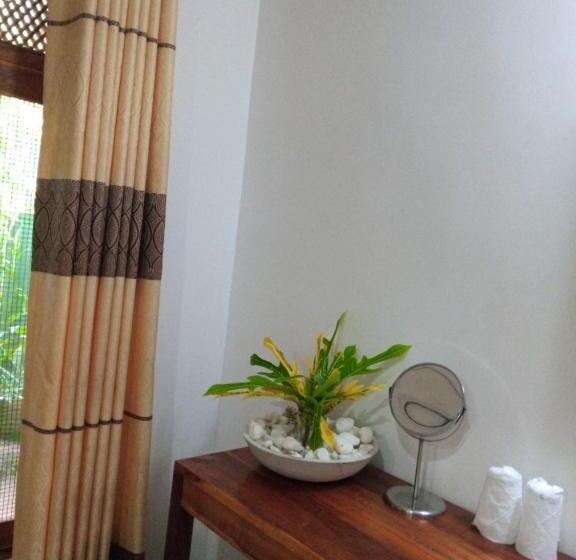 اتاق استاندارد چهارنفره با چشم‌انداز باغ, Sansala Guesthouse & Restaurant