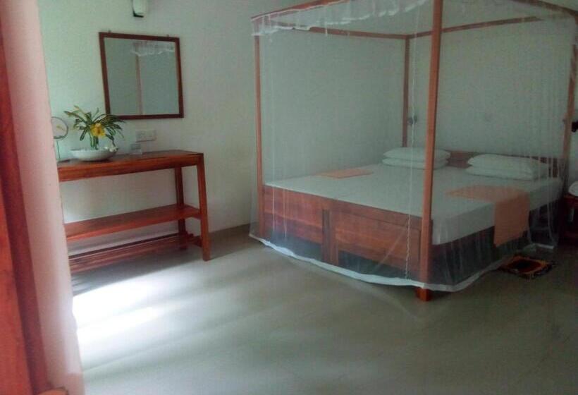 اتاق استاندارد چهارنفره با چشم‌انداز باغ, Sansala Guesthouse & Restaurant